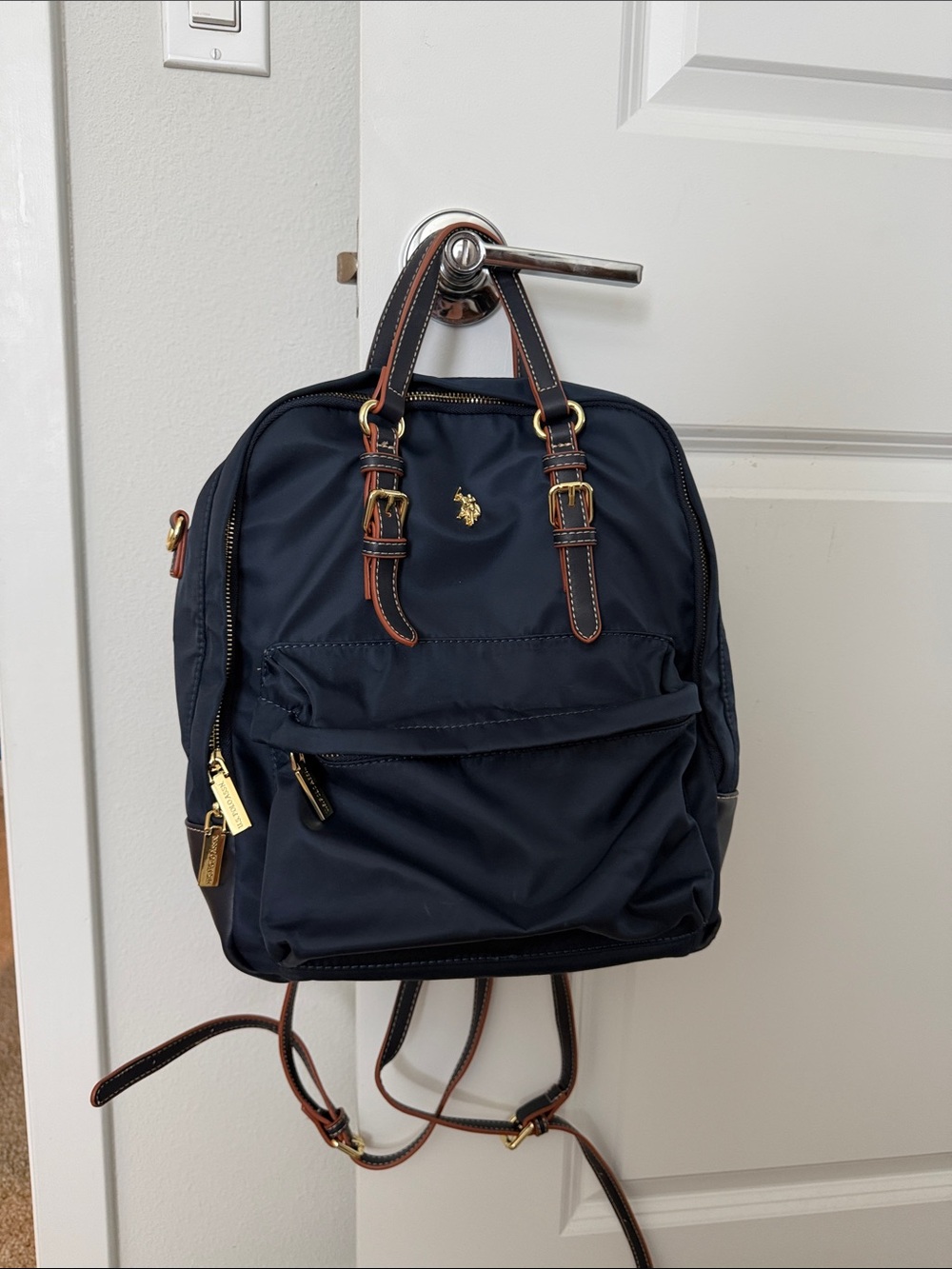 U.S. Polo Assn. Navy Backpack with Brown Trim and Gold Accents